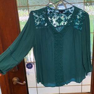 Turquoise blouse with lace and embroidery . New without tags.